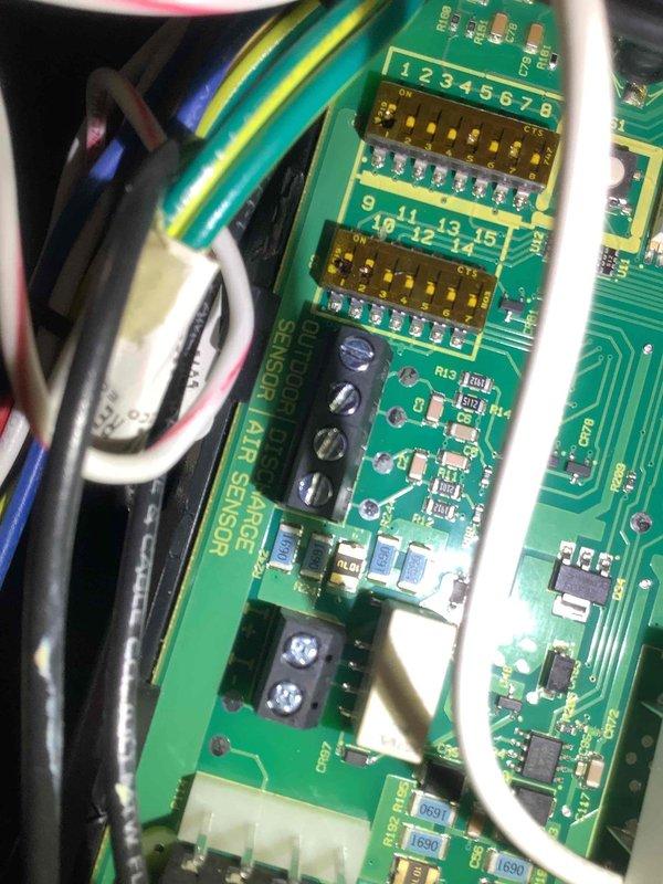 Performed scheduled MVP heating maintenance service. Inspected control board wiring and DIP switch configuration on the SENSOR BRIDGE circuit board. Used specialized tool to make necessary adjustments to system components.