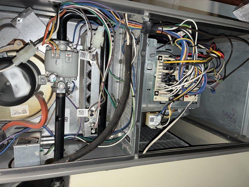 Performed routine maintenance on 9-year-old furnace as part of MVP recurring service program. Inspected AprilAire humidifier installation and condition. Examined electrical control panel components including wiring connections, circuit boards, and motor assembly to ensure proper functionality for the heating season.