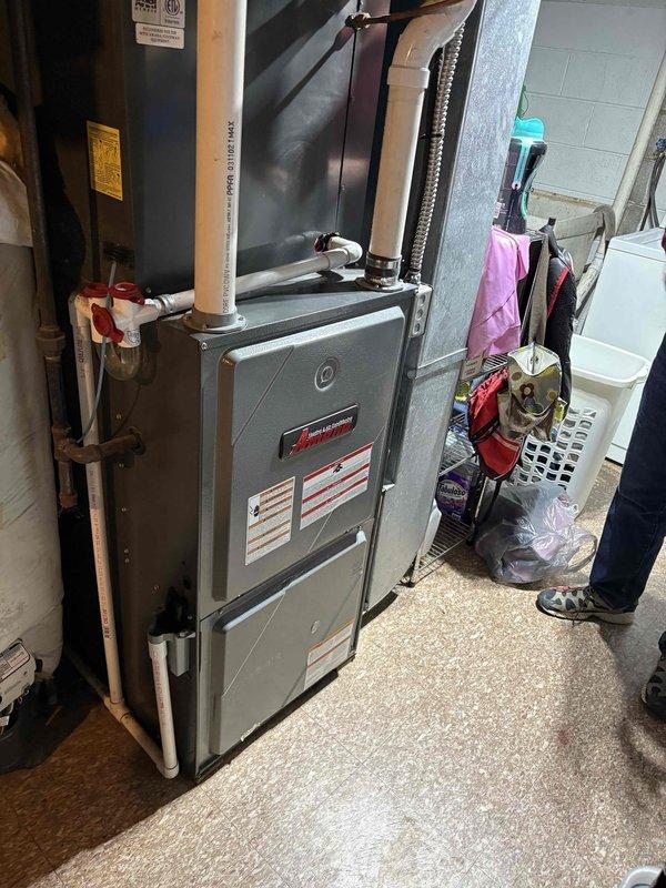 Performed assessment on 15-year-old Goodman furnace, identifying a cracked secondary heat exchanger. Documented existing electrical panel configuration and current system installation. Provided replacement quotation with financing options available at 1/16 interest rate for 10 years.