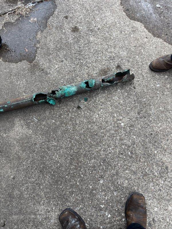 Replaced severely corroded copper drain pipe in basement, installing new PVC connections to the existing vent and high rough drain. Installed new toilet flange and shower strainer to prevent future backups. Snaked through cleanout to verify proper drainage.