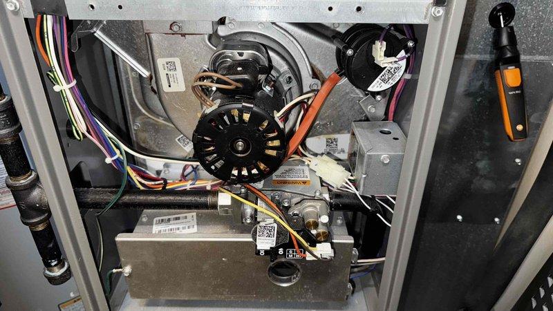 Performed scheduled BS-MVP heating maintenance service. Conducted internal inspection of furnace components including motor, wiring harness, and gas valve assembly. Completed combustion analysis using Bacharach analyzer, which showed O₂ at 15.1%, CO at 14ppm, efficiency at 76.6%, and CO₂ at 3.3% on natural gas system.