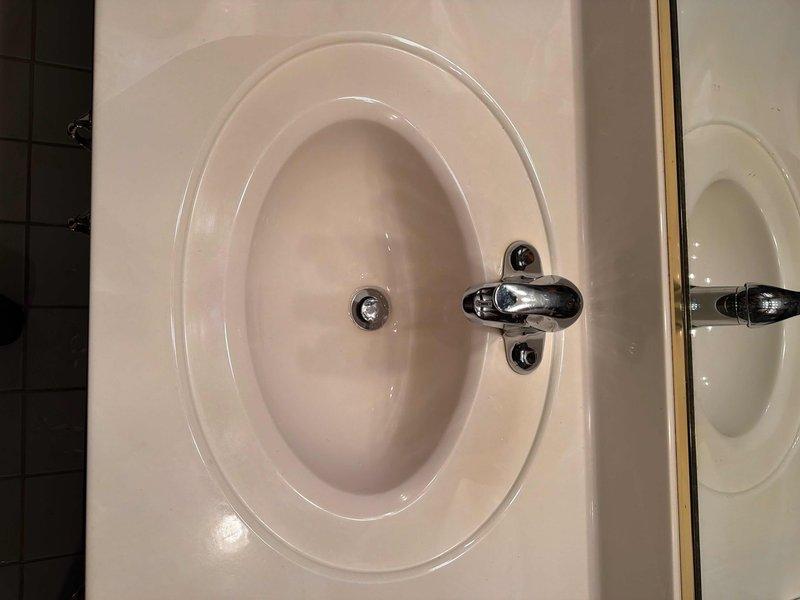 Completed installation of four new lavatory faucets with traps and shut-offs, a deck-mounted laundry faucet with shut-offs, and a new kitchen faucet with shut-offs as quoted. Additionally, cut out and replaced shut-offs to washer box in basement. All installations were completed after parts were retrieved from will call location.