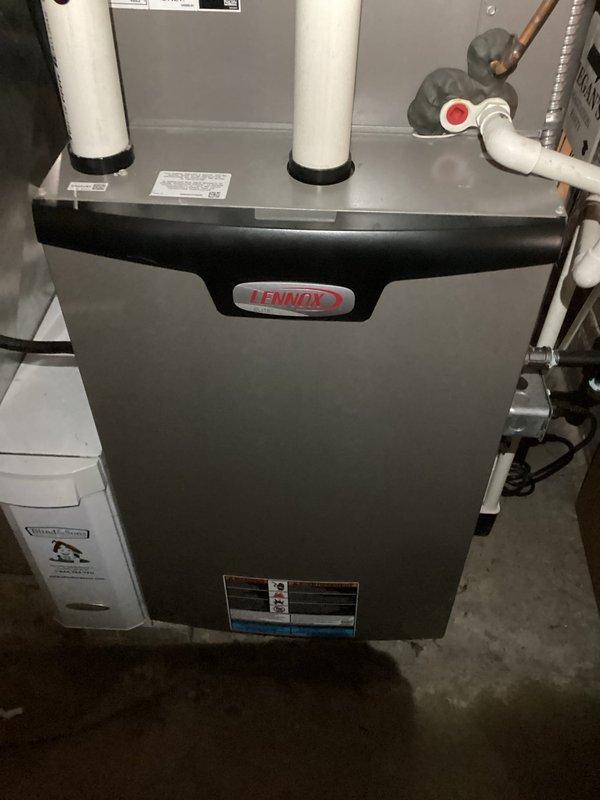 Performed scheduled MVP heating maintenance service on Lennox furnace. Inspected all components including filter and humidifier system, verified proper installation of PVC exhaust/intake piping, and examined connections. System is functioning properly with no issues identified.