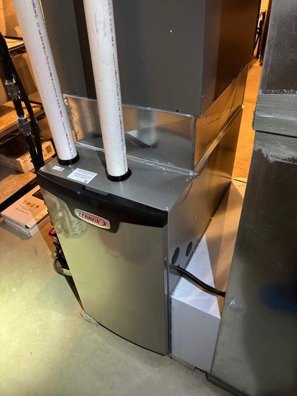 Performed scheduled furnace tune-up service on 3-year-old Lennox heating system under maintenance plan. Inspected control board circuitry and connections for proper operation. All components functioning normally with no issues identified in the electrical system or ventilation. Unit is in good working condition.
