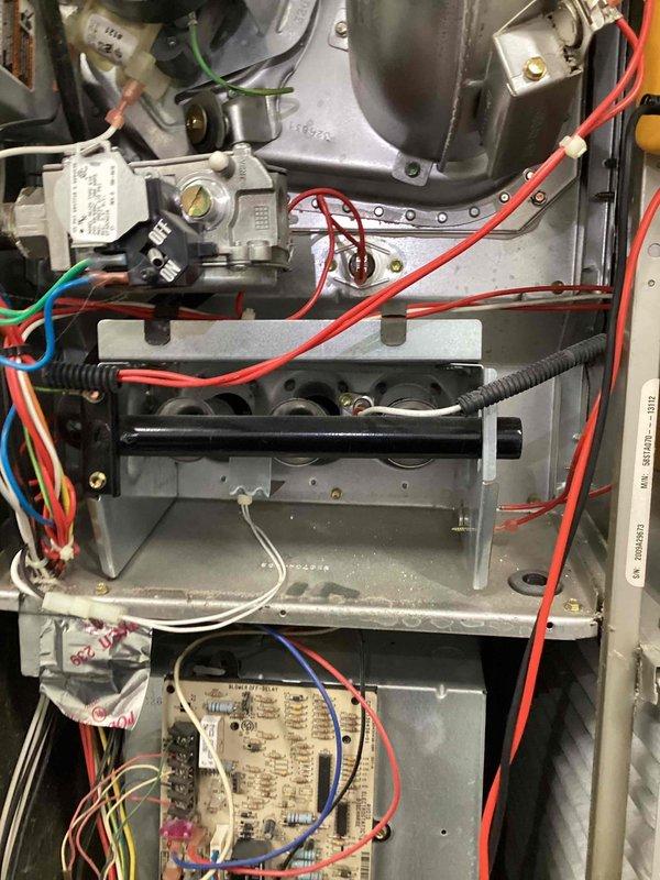 Responded to emergency no-heat call for furnace of undetermined age. Upon inspection, found faulty control board causing system failure. Replaced circuit board, reconnected all wiring harnesses to appropriate terminals, and verified proper gas valve operation. System now functioning normally with consistent heat output.