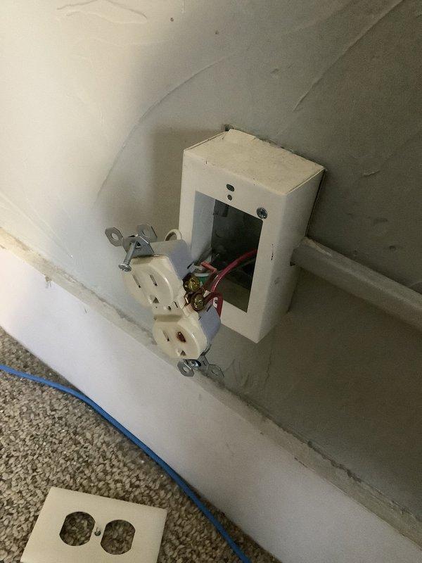 Replaced damaged electrical receptacle that had been blown by a heater. Removed old outlet, installed new duplex receptacle with proper wire connections, and secured outlet cover plate. Verified proper functionality after installation was complete.