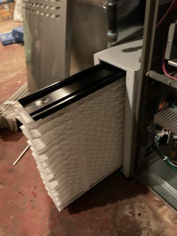 Performed routine furnace maintenance on 2-year-old unit with MVP coverage. Inspected internal components including control board, gas valve, and blower motor assembly. Removed and replaced air filter to ensure proper system airflow. All connections and wiring verified to be secure and in good working condition.