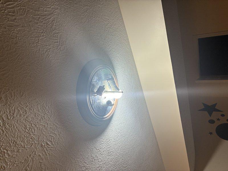 Diagnosed and repaired intermittent kitchen circuit issues causing outlet failures and light flickering. Replaced faulty receptacle with new metal-bracketed outlet box and rewired connections to restore proper electrical function. Shower fixture was inspected but no service was required as it was operating normally.