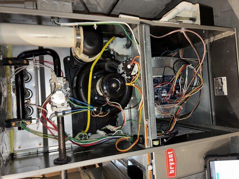 Performed scheduled MVP Heating maintenance service, including comprehensive inspection of furnace components. Accessed and examined internal system elements including blower motor assembly, circuit board connections, and wiring harnesses. All components were verified to be in normal operating condition with proper electrical connections intact.