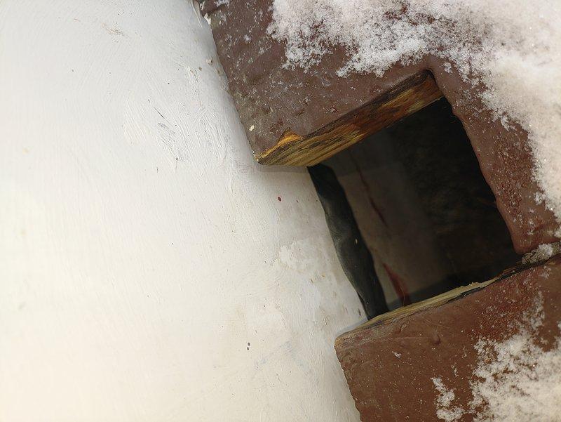 Performed warranty service to address failed inspection. Removed old service entrance conductors and conduit. Extended service mast to required height to ensure proper clearance for service drip loop, and secured/fastened two conduits properly to the side of the panel per code requirements.
