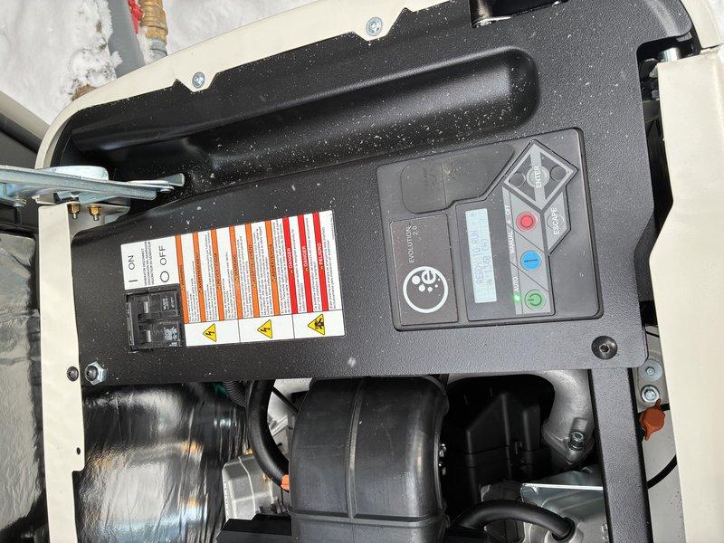 Responded to service call for Generac generator system. Installed transfer switch on exterior wall with proper conduit connections. System was successfully mounted with PVC conduits extending to junction boxes. Customer requires follow-up visit for operational training as previously promised by technician.