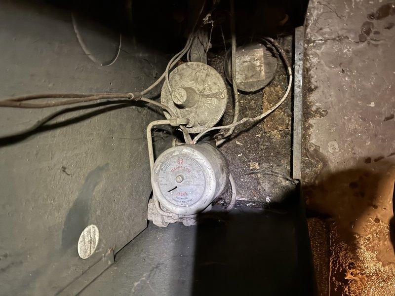 Responded to emergency service call for active leak in aging boiler system. Upon inspection, identified significant corrosion on pressure gauge assembly and surrounding fittings. Replaced damaged components, pressure tested system, and verified proper operation of heating unit.