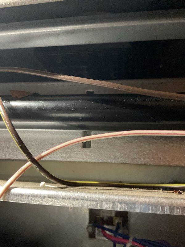 Performed heating maintenance service on HVAC system. Inspected refrigerant lines and copper tubing for proper condition, and verified readings on system monitoring device. All components appeared to be functioning normally with no visible damage or issues detected.