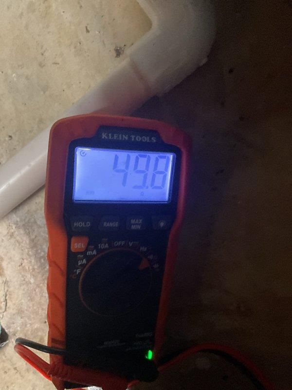 Performed scheduled MVP heating system maintenance. Conducted electrical testing with digital multimeter, verifying voltage readings of 49.0V. Inspected condensate drain line and connecting components for proper drainage function and cleanliness.