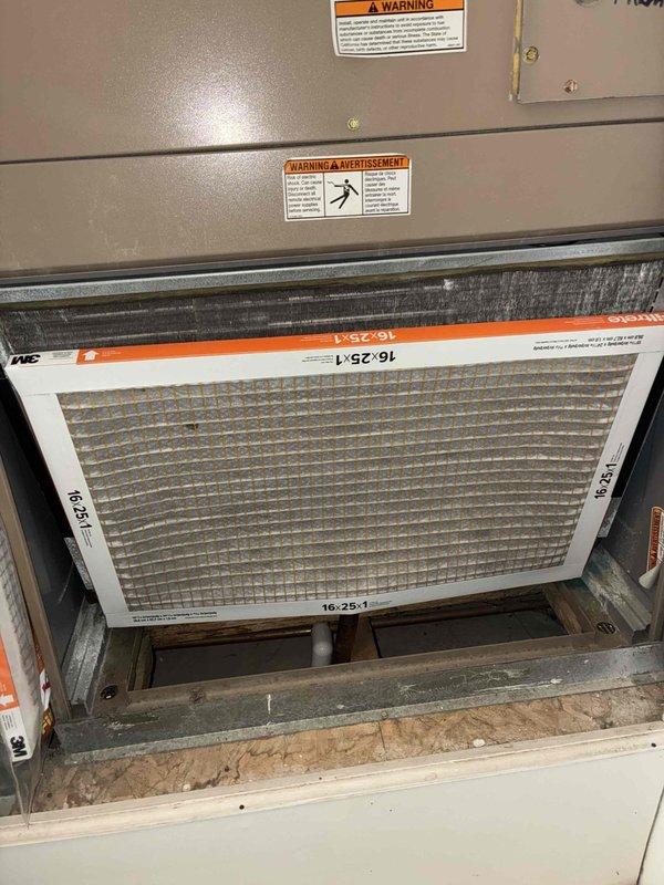 Performed scheduled furnace tune-up service. Inspected and verified proper installation of air filtration system (16.25.1 filter). Examined internal wiring connections and valve assembly, noting minor corrosion on metal components. System is operational with recommended maintenance completed.