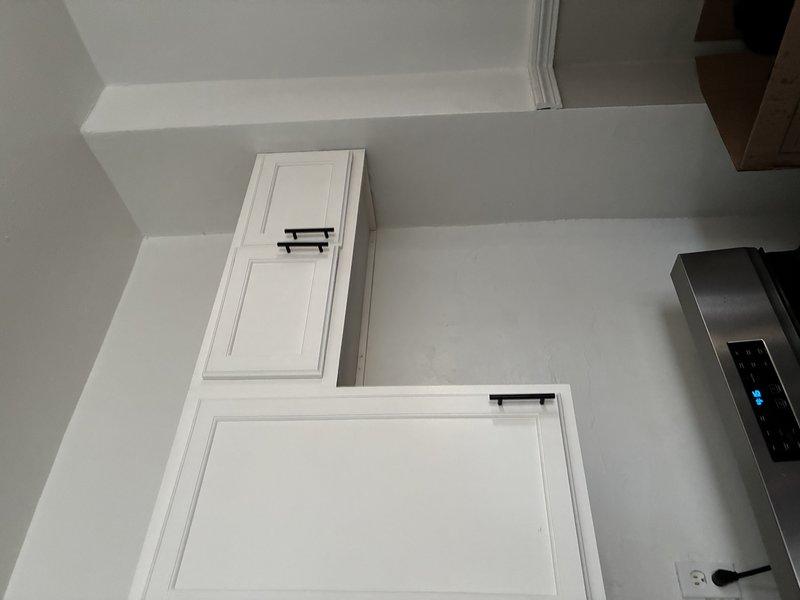 Performed assessment for grounded outlet installation in residential property. Inspected exterior electrical conduit on brick surface and evaluated kitchen/laundry area for outlet replacement requirements. Recommended upgrade to grounded receptacles to improve electrical safety and code compliance.