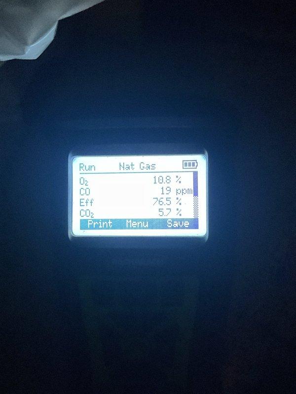 Performed scheduled MVP Heating maintenance service on customer's furnace after rescheduling. Conducted combustion analysis showing 76.5% efficiency with O₂ at 10.8%, CO at 19ppm, and CO₂ at 5.7%. Made minor adjustments using hex key tool to optimize system performance.