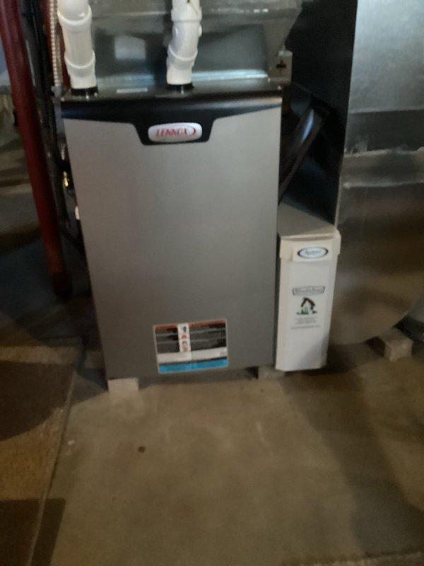 Performed routine maintenance on Lennox furnace system. Inspected and replaced dirty air filter with visible discoloration. System now operating at optimal efficiency with improved airflow and filtration.