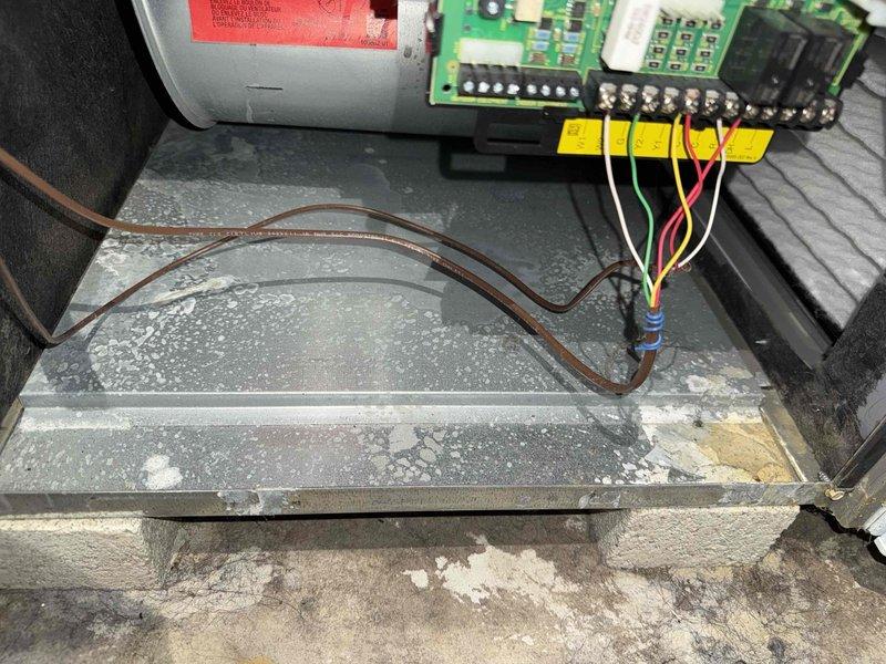 Diagnosed 5-year-old gas furnace that was non-operational. Inspection revealed significant rust and corrosion on the heat exchanger along with a failing control board connected to the blower motor. Replaced damaged components to restore proper system functionality.