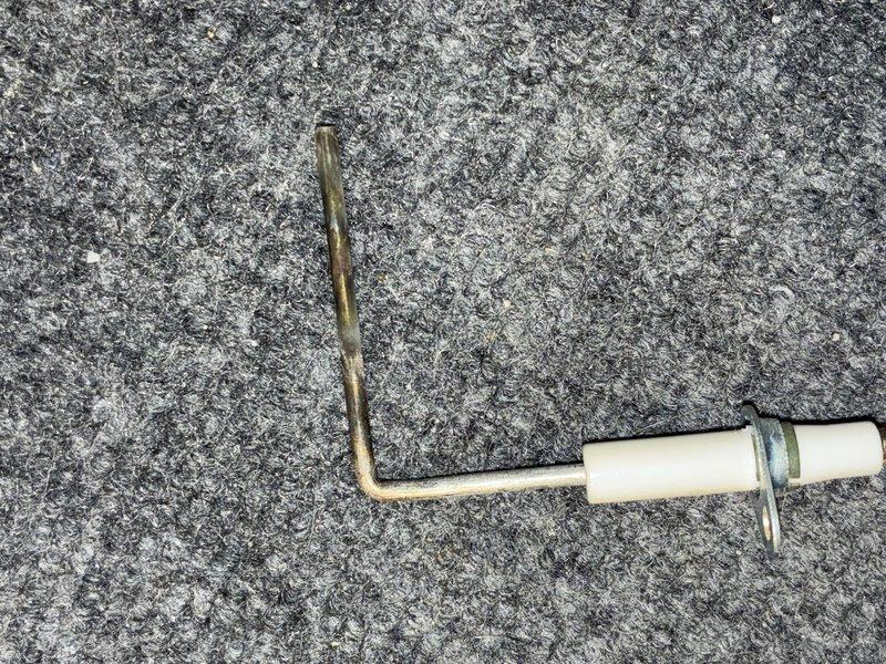 Performed routine maintenance on 12-year-old heating system. Inspected and documented condition of air filter showing moderate dust accumulation. Examined copper refrigerant line for proper installation and condition.