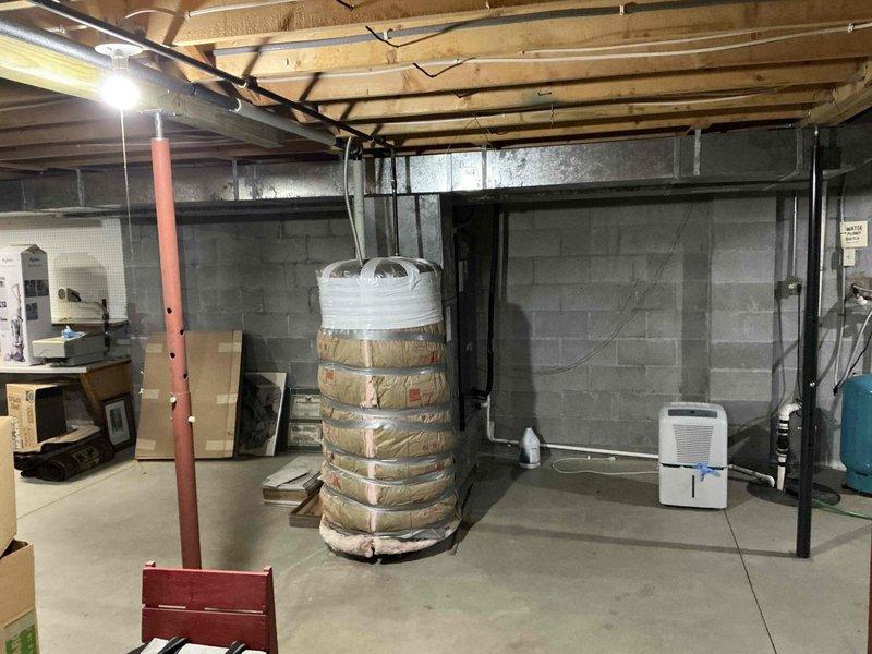Conducted furnace replacement estimate for customer seeking to convert from heat pump to propane system with ductwork modifications. Customer specifically requested horizontal unit installation instead of vertical configuration. Current system is a Lennox unit installed in basement with metal ductwork and flexible connections that will require reconfiguration to accommodate the new propane heating system.