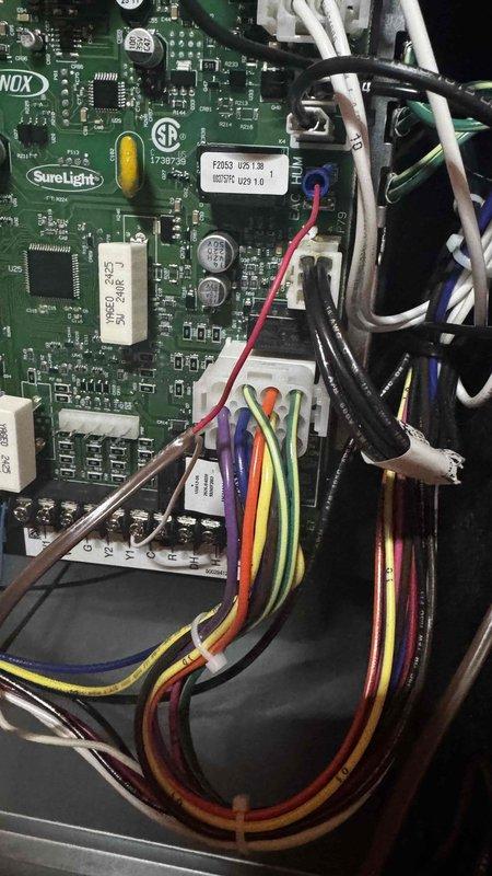 Responded to service call for new furnace installation displaying "ID Blower Motor Start Fault" error and "service urgent" warning. Inspected SureLicht control board connections and wiring, finding loose terminal connections on the PCB. Secured all wire connections to resolve the startup fault issue, verified proper operation through complete heating cycle test.