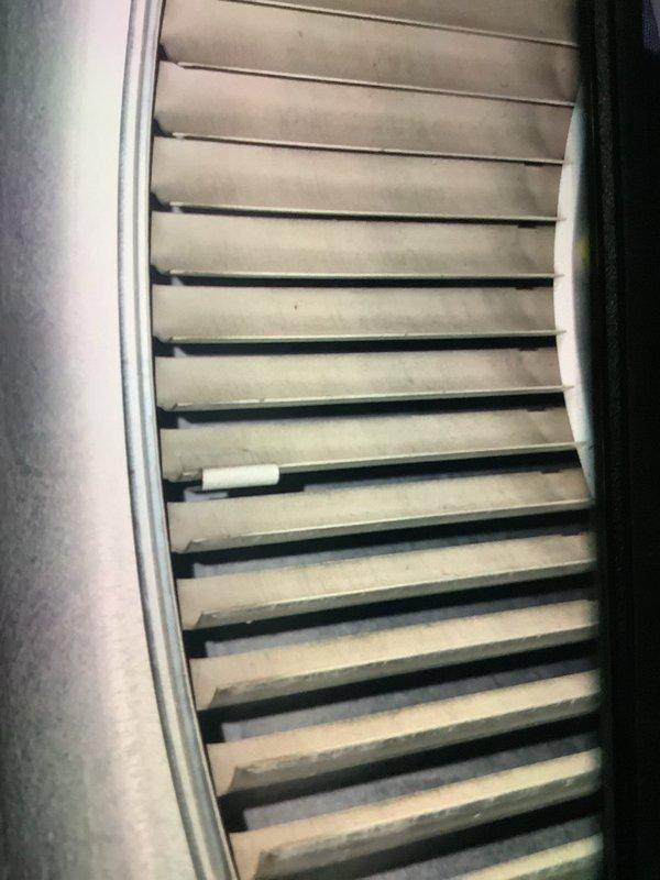 Performed scheduled MVP furnace maintenance. Inspected ventilation system, noting dust accumulation on vent louvers requiring cleaning. Examined valve assembly and drainage system, identifying red substance (likely rust inhibitor) in the condensate drain pan that was cleared to prevent blockage. All components now functioning properly.