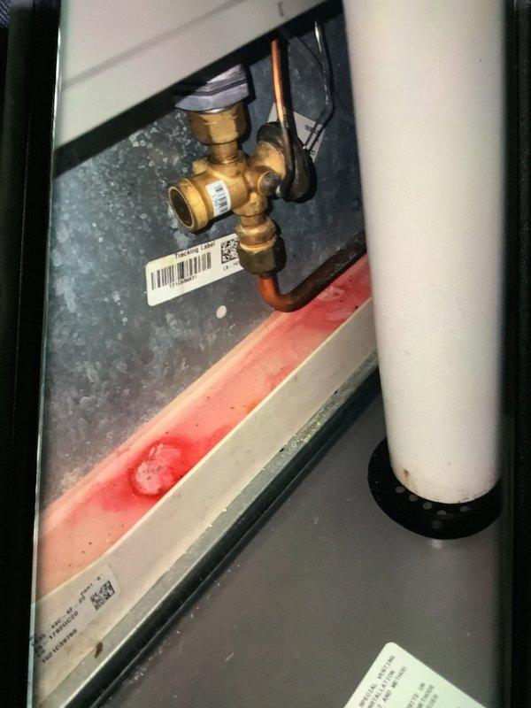 Performed scheduled MVP furnace maintenance. Inspected ventilation system, noting dust accumulation on vent louvers requiring cleaning. Examined valve assembly and drainage system, identifying red substance (likely rust inhibitor) in the condensate drain pan that was cleared to prevent blockage. All components now functioning properly.