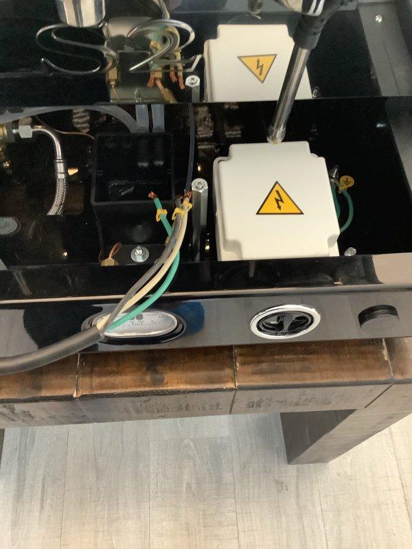 Installed a 20A/220V dedicated circuit for customer's coffee machine, which included mounting a new receptacle and wiring a male plug for the equipment. Replaced existing 30A breaker with appropriate 20A breaker to match load requirements and ensure proper circuit protection. Verified proper voltage and grounding at installation point before completing service.