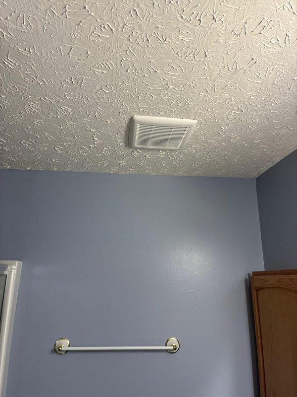 Successfully replaced master bathroom exhaust fan after diagnosing non-functional unit with faulty motor. Verified proper electrical supply (120V) to the connection point and confirmed ventilation pathway through existing soffit vent. New fan installation completed with all components from Mars, Lowes, and Xsense properly integrated into the existing ventilation system.