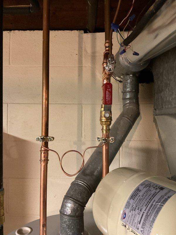 Successfully removed existing 40-gallon water heater and installed new short model with all required code upgrades. Completed installation of new copper piping with appropriate valves and fittings mounted to utility room wall. Water system fully tested and operational.