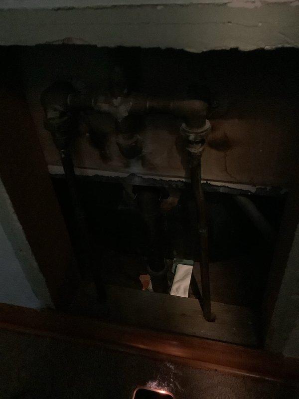 Repaired two leaky faucets in customer's 67-year-old home by replacing worn washers. Fixed malfunctioning bathtub drain stopper mechanism, restoring proper functionality. Inspected copper plumbing infrastructure behind access panel to verify no additional leaks were present in the system.