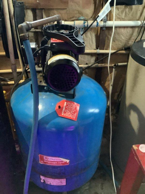 Diagnosed and serviced Kinetico water treatment system with completely dry tank. Upon inspection of exterior plumbing connections and internal pressure tank system, restored water flow by priming the pump and checking for blockages in the supply line. System now operational with proper pressure maintained.
