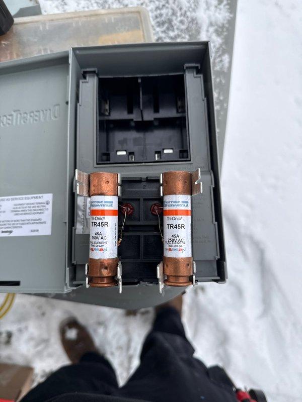 Completed installation of a new Lennox 90% efficient furnace with air conditioning system and hot water tank. Verified proper electrical connections at the disconnect box with 45A/250VAC TR45R fuses. System includes properly installed PVC venting with all required ductwork modifications and connections to ensure optimal performance.