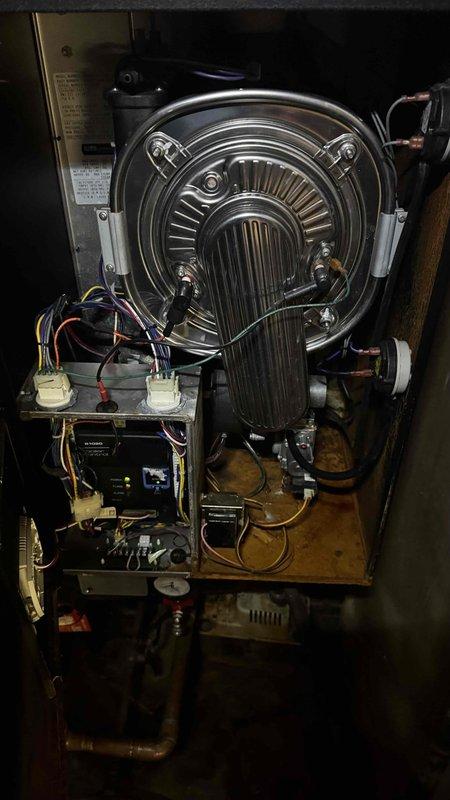 Performed diagnostic assessment on 10-15 year old residential boiler system. Inspected brass valve connections and heat exchanger assembly for operational issues. Serviced and reconnected plumbing components, ensuring proper function of the control board and electrical connections.