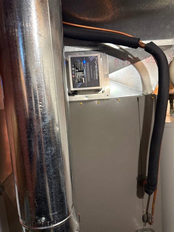 Successfully installed an Aprilaire 600 whole-home humidifier and air scrubber system to improve indoor air quality. The humidifier was properly mounted to existing ductwork with all necessary electrical connections made to the control panel. Both units were tested for proper operation with humidity levels verified on the digital display.