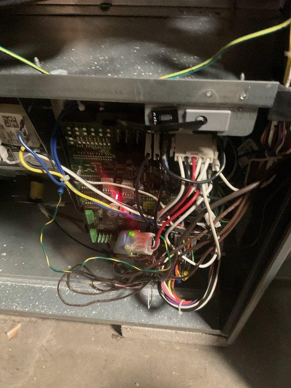 Performed scheduled MVP Heating maintenance visit. Inspected system and found evaporator coil/filter with significant dust and debris accumulation causing brownish-yellow discoloration. Examined control board and electrical components, noting all connections secure with operational indicator light. Cleaned filter element and verified proper system function before completing service.