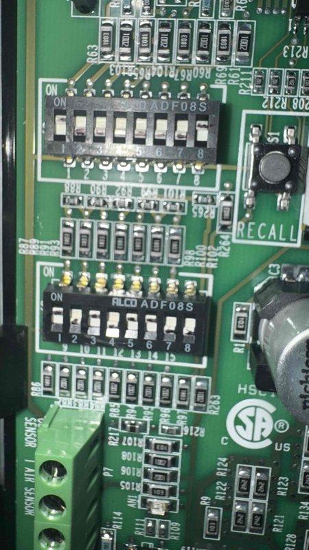 Diagnosed no heat issue and replaced faulty control board under warranty. Installed new PCB with proper DIP switch configuration, featuring dual switches (8-position and 6-position) and verified system operation. Replacement parts were ordered and installed according to manufacturer specifications.