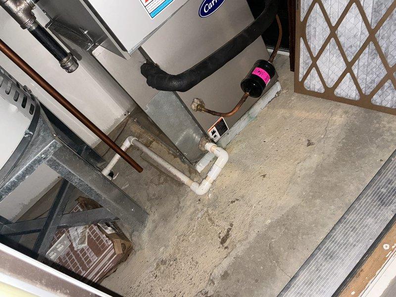 Conducted comprehensive assessment of existing HVAC system, including inspection of outdoor AC unit with significant snow accumulation and evaluation of indoor Carrier air handler unit in mechanical room. Prepared replacement estimate for complete system upgrade, noting current installation's age and configuration with particular attention to ductwork connections and utility interfaces.