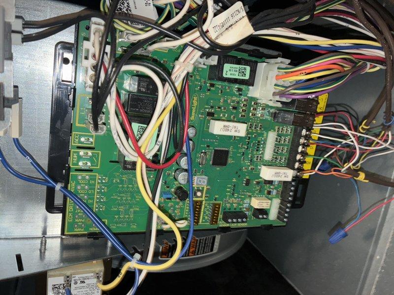 Performed scheduled fall maintenance on 6-year-old furnace. Inspected control board and electrical connections, confirming proper wire connections to circuit board terminals. Examined internal components including fan assembly and drainage system, all found in good working condition with no visible issues.