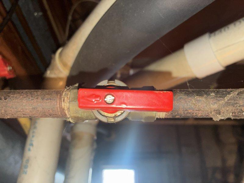 Completed recurring heating maintenance service on both sides of 8-year-old duplex system. Inspected copper piping showing signs of corrosion and mineral buildup near shutoff valve. Replaced deteriorated fiberglass insulation material to improve system efficiency.