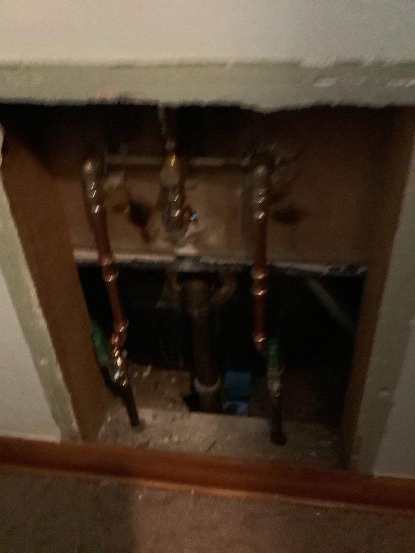 Installed new Moen 3-handle shower valve in bathroom with existing light blue ceramic tile. Added ball valves and transition fitting for riser to complete the installation. Parts were ordered for will call pickup to replace the aging fixture that showed significant wear and discoloration.