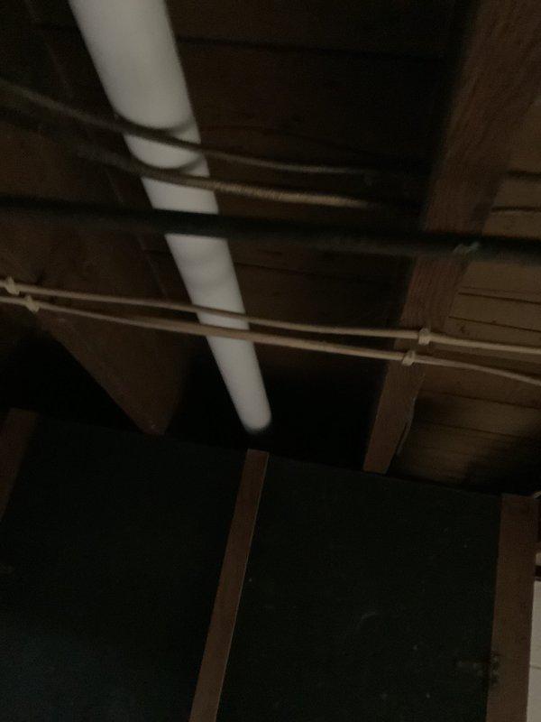 Completed estimate for furnace replacement due to heat exchanger failure. Existing Bryant/Carrier unit (89k BTU) shows significant corrosion and rotted heat exchanger requiring full system replacement. Inspected current venting configuration and condensate drainage system in utility area for replacement planning.