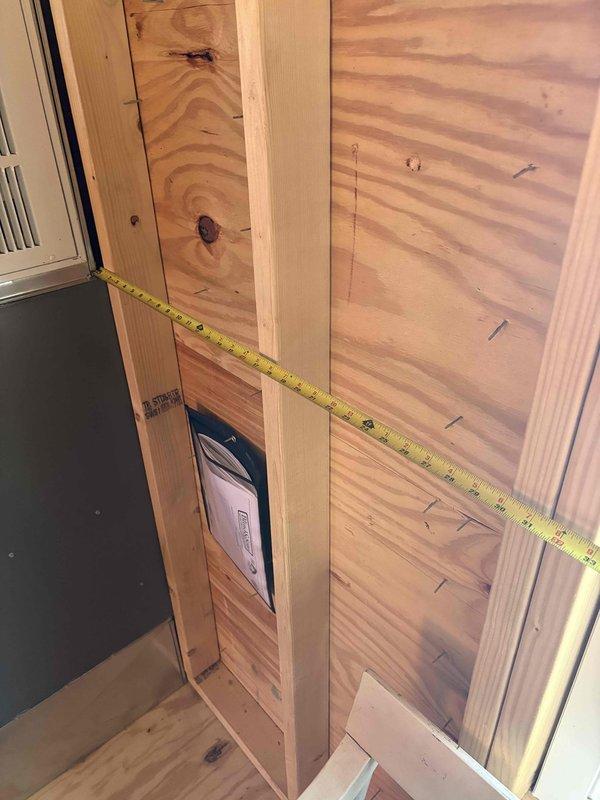 Conducted preliminary assessment for garage air conditioning installation. Evaluated existing wall framing and electrical infrastructure. Documented transformer specifications (Transco POLY-LOK, 120V primary/7500V secondary) to determine compatibility with proposed HVAC system.