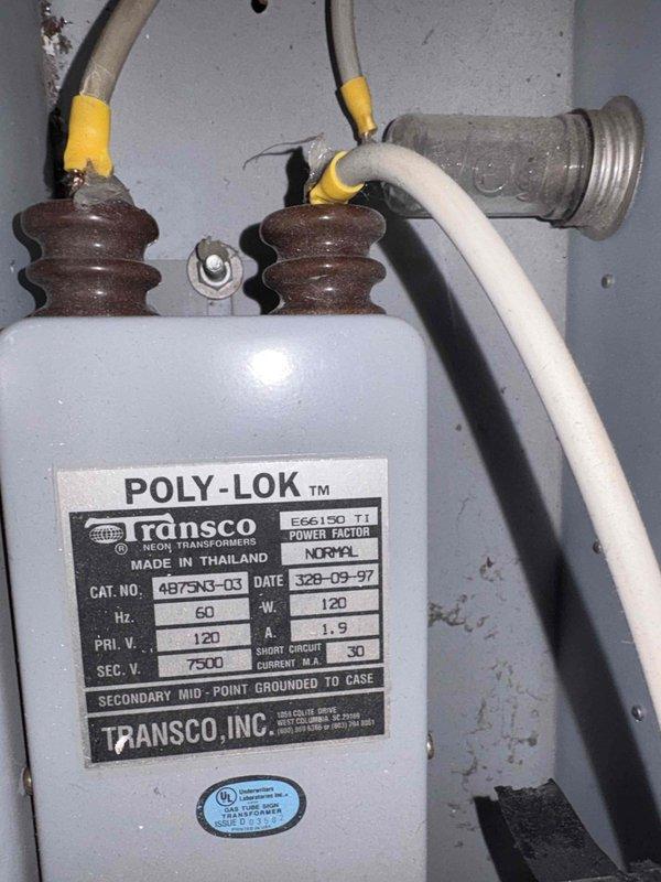 Conducted preliminary assessment for garage air conditioning installation. Evaluated existing wall framing and electrical infrastructure. Documented transformer specifications (Transco POLY-LOK, 120V primary/7500V secondary) to determine compatibility with proposed HVAC system.