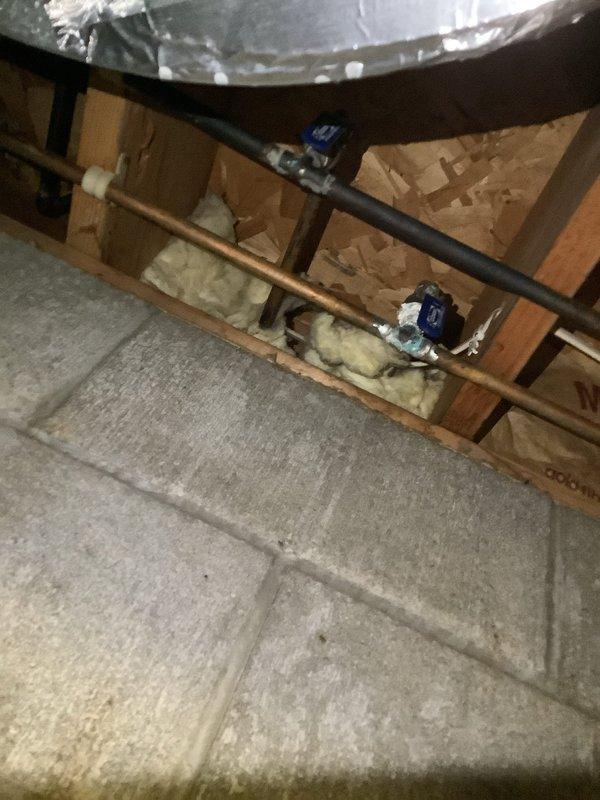 Repaired leaking garage spigot by accessing and replacing damaged supply line valves behind wall access panel. Completed bathtub faucet replacement in upstairs bathroom, ensuring proper installation and function with no leaks after testing.