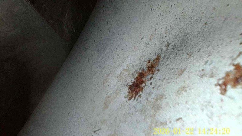 Completed routine tune-up service on two HVAC systems (21 years and 2 years old). During inspection, identified water damage on ceiling, evidenced by circular brown stains, likely indicating condensate drain issues or possible refrigerant leak. Documented corrosion on nearby surfaces for future reference.