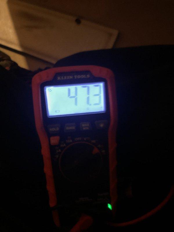Performed scheduled maintenance on 4-year-old heating system. Conducted electrical diagnostics using multimeter (measured 473 ohms) and verified proper flame temperature with infrared thermometer (595°F). System operating within normal parameters.