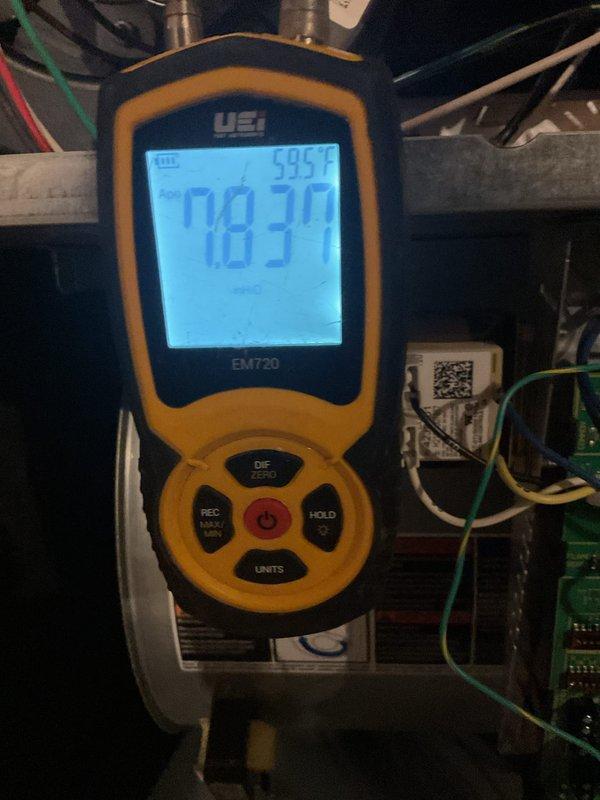 Performed scheduled maintenance on 4-year-old heating system. Conducted electrical diagnostics using multimeter (measured 473 ohms) and verified proper flame temperature with infrared thermometer (595°F). System operating within normal parameters.