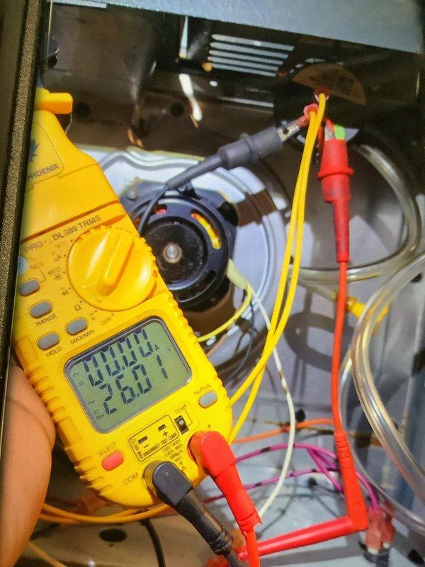 Diagnosed and repaired a 10+ year old furnace that was blowing cold air during urgent no-heat call. Testing revealed faulty pressure switches preventing proper ignition sequence. Replaced both pressure switches (identified by green circular stickers) and verified proper operation with multimeter testing, restoring heat function to the system.